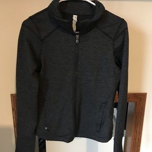 tight workout zip-up